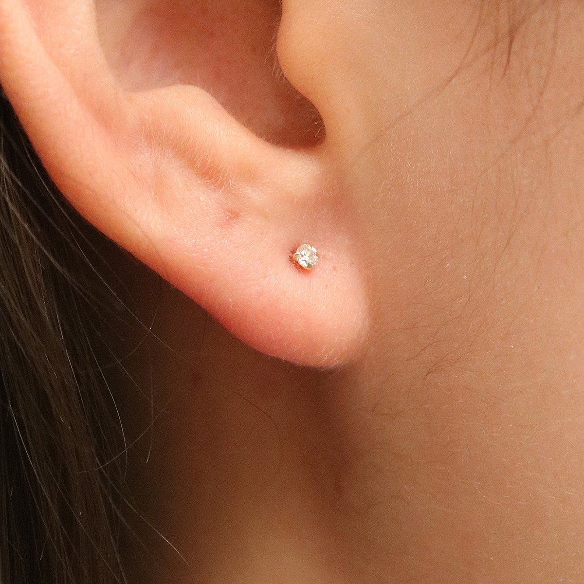 Four prong White Topaz studs - Transpire