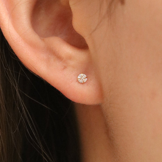 Four prong White Topaz studs - Transpire