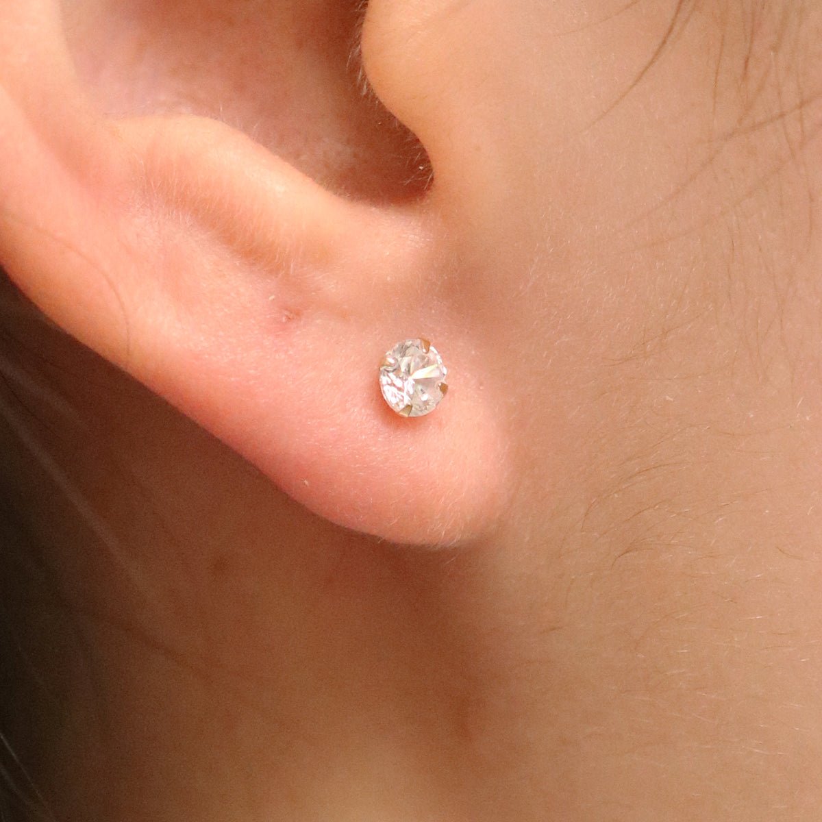 Four prong White Topaz studs - Transpire